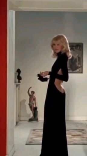 Pinterest Mireille Darc in the legendary black velvet dress made by her friend Guy Laroche in 1972